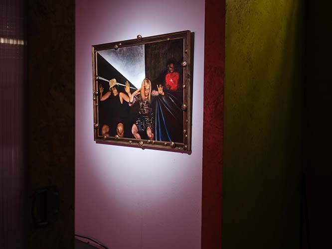 Jacqui and Jill painting in exhibition